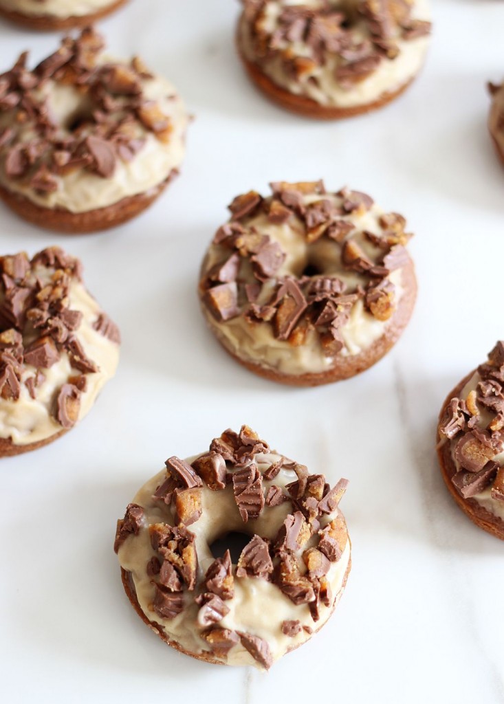 Baked chocolate donuts with peanut butter glaze and reese's peanut butter cups 11
