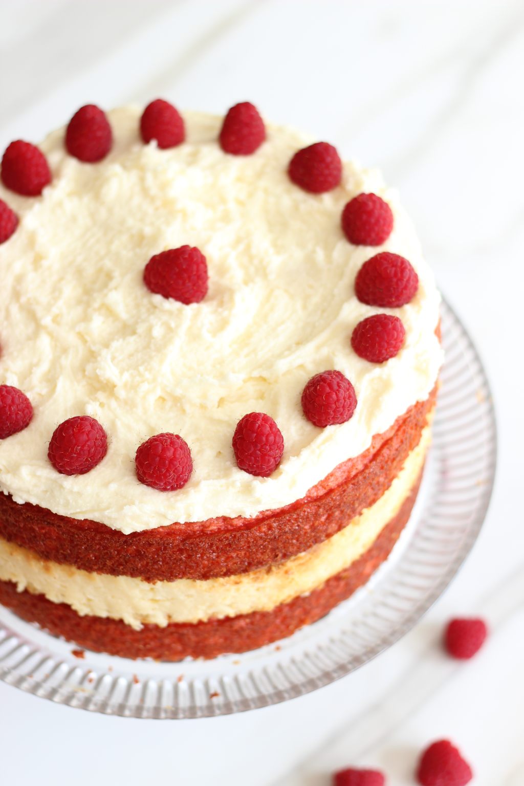 Raspberry White Chocolate Cheesecake Cake