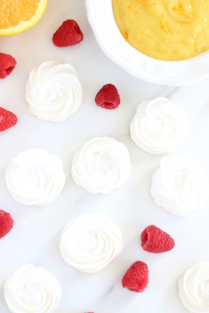 meringue nests with orange curd and raspberries 5