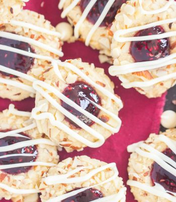 White Chocolate Raspberry Almond Thumbprint Cookies recipe image thegoldlininggirl.com 600x900 4