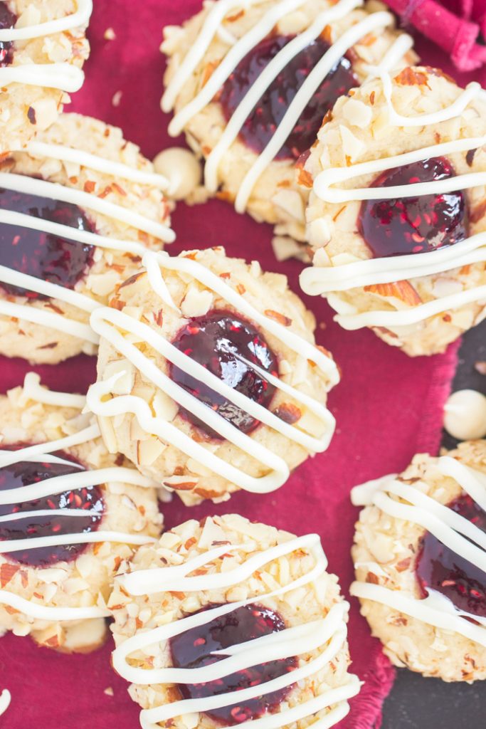 White Chocolate Raspberry Almond Thumbprint Cookies recipe image thegoldlininggirl.com 10